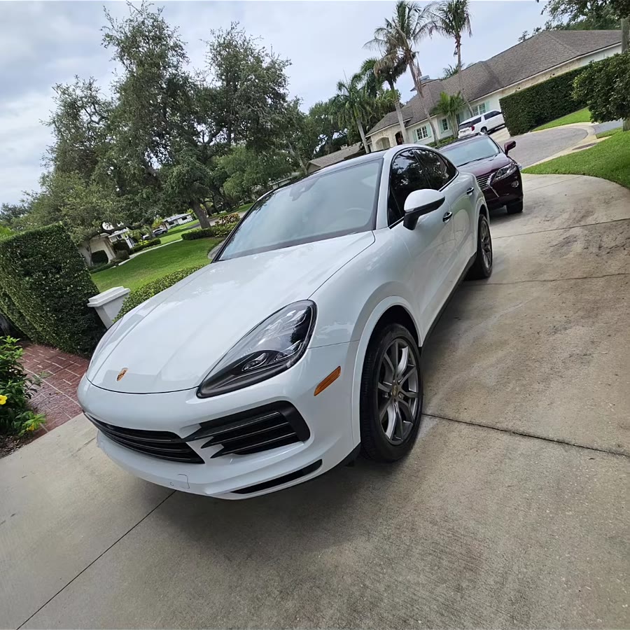 White Porsche Cayenne after a detail