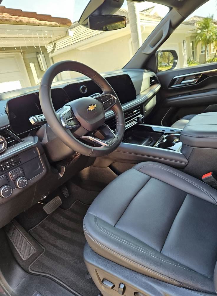 Chevrolet SUV front seats and dash after detailing