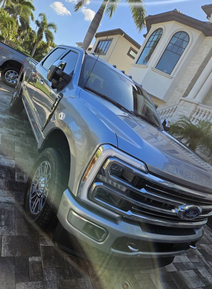 Silver Ford Super Duty, freshly washed