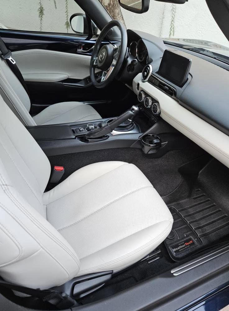 Miata white seats and clean floor mats