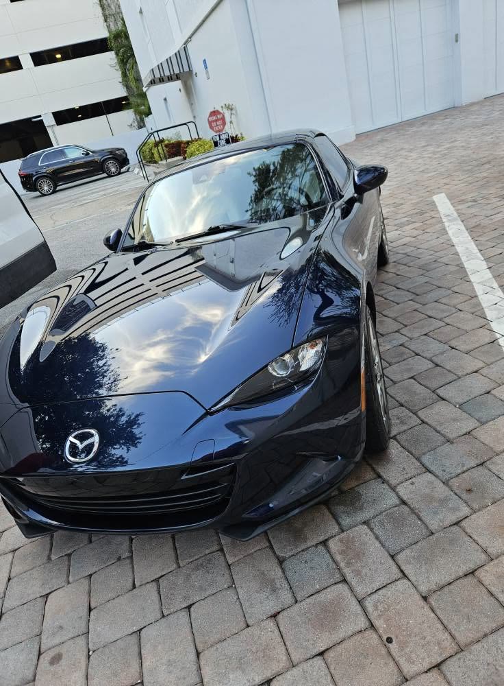 Navy Mazda MX-5 Miata after a detail