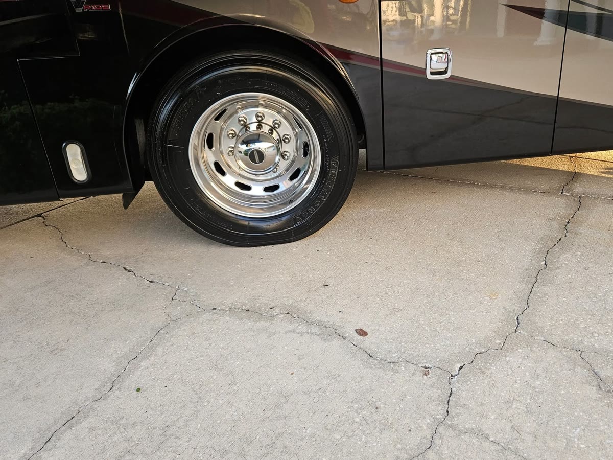 Polished aluminum wheel on a motorcoach